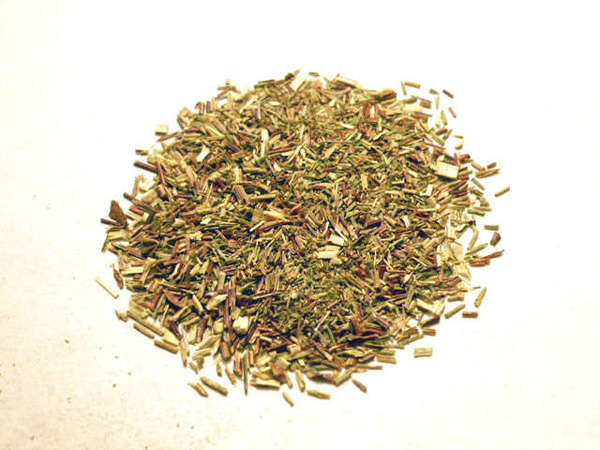 Loose-leaf green rooibos, small, pale yellow-green twigs with a few bronze-colored ones mixed in