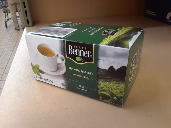 Box of Benner Tea Co Peppermint Herbal Tea, with Green Color scheme, on shelf