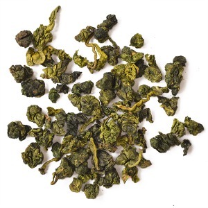 Yellowish green, tightly-rolled tea leaves