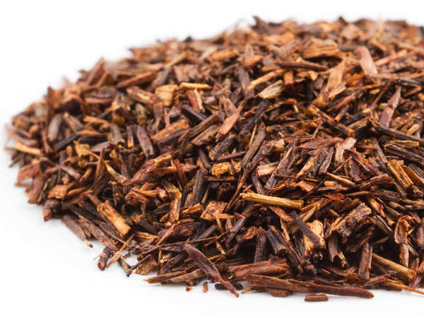 Loose-leaf rooibos, with rich red color, looking like small pieces of stem and needle-like leaves